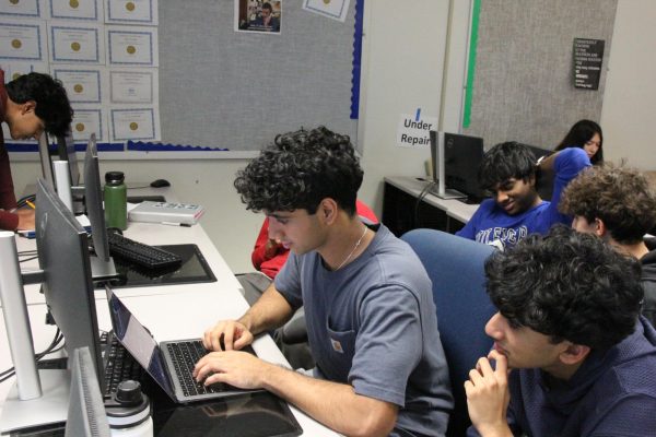 Navin Ramamoorthy prepares for an after-school HOSA meeting. 