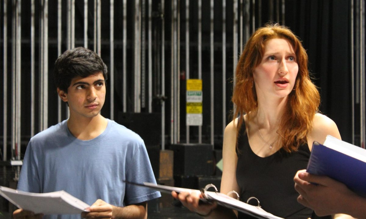 Carl Taraporevala, senior, rehearses lines for his lead role of Peter with Ava Smith, senior, who will act as Molly Aster, in the fall play “Peter and the Starcatcher.” The play will run from Thursday, Nov. 21, to Sunday, Nov. 24.