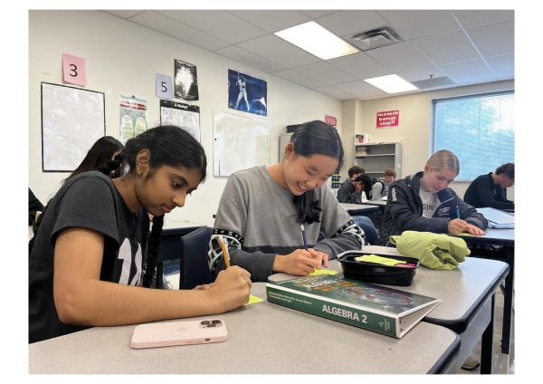 Juniors Keerthi Pakalapati, Jamie Park and Ellie Pagan (left to right) write Gratitude Grams in their Ac Lab homeroom. Students could choose to deliver the notes themselves or give them to Student Council members to deliver at a later date.