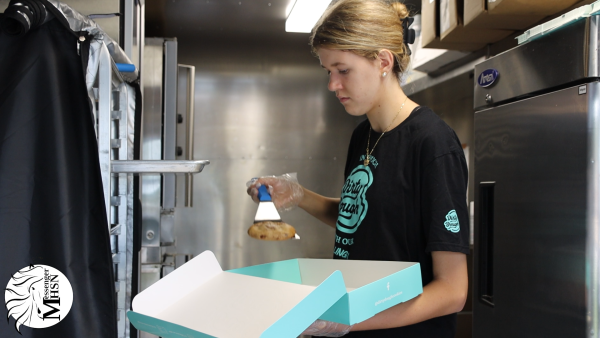 If you're ever driving down Manchester Road, you might see the new cookie store, Dirty Dough next to the Skyzone at Manchester. We interviewed John Hamrick, the owner, and Kira Dufner, an employee, on how opening the physical store is going and how working at their food truck has been so far.