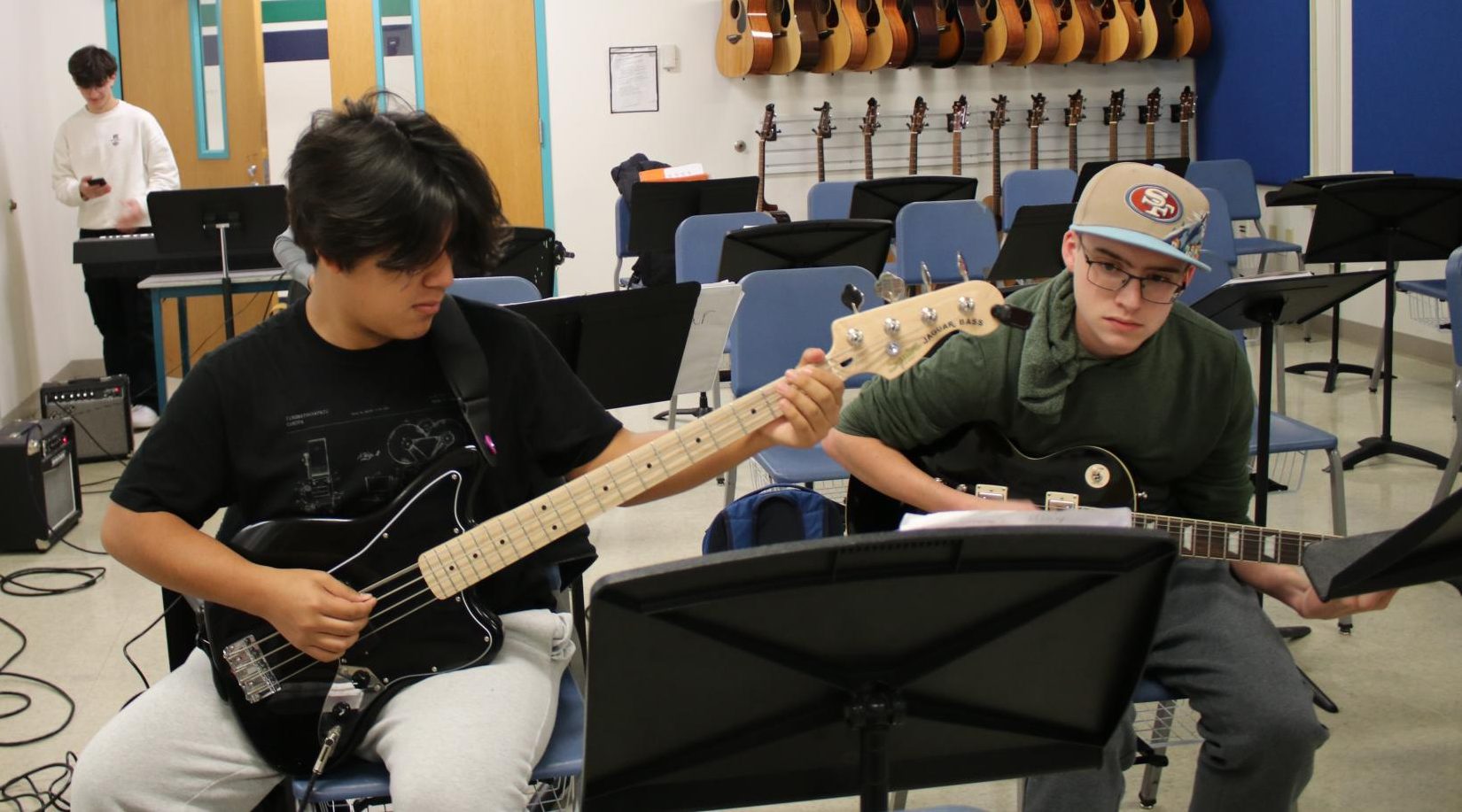 Sophomores Ernesto Torres and Jason Krogen warm up during their band practice. They are a part of Reverb, one of five bands that plays after school most Tuesdays each week. 