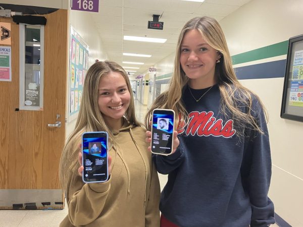 Ashlyn Maxwell, junior, and Marin Lally, senior, show their Spotify Wrapped overviews.