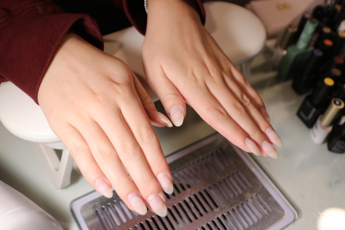 The finished project after Jordan Farmer applies gel onto Audrey Saunders nails.