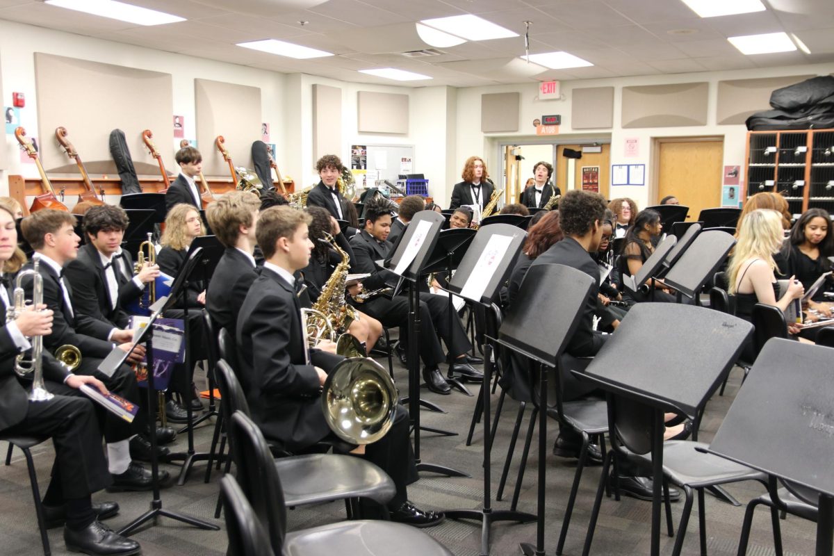 Students practice in the orchestra room just before their performance at MHS' Large Ensemble Festival on March 2, 2026. 