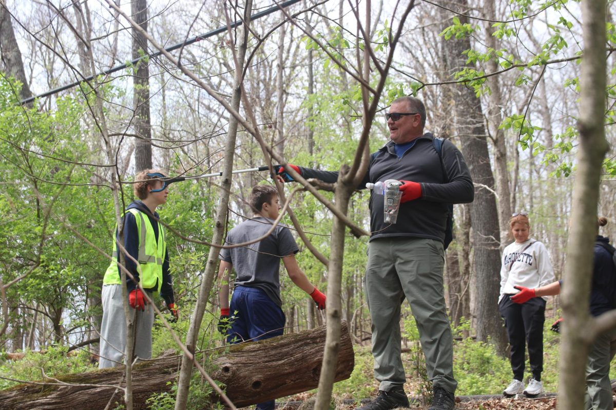 Students and staff pick up litter at Castlewood State Park on Tuesday, April 7. While ACT testing occured at MHS, freshmen were assigned to volunteer at location on- or off-campus as part of the first-ever freshmen service learning day.