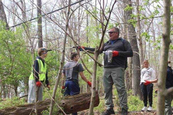 Students and staff pick up litter at Castlewood State Park on Tuesday, April 7. While ACT testing occured at MHS, freshmen were assigned to volunteer at location on- or off-campus as part of the first-ever freshmen service learning day.