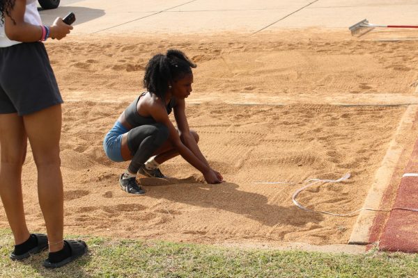 Chloe Tabb, senior, measures her jump during a practice at MHS on Thursday, April 9. Tabb competed at the Nike Indoor Nationals the month before, placing 11th in triple jump.