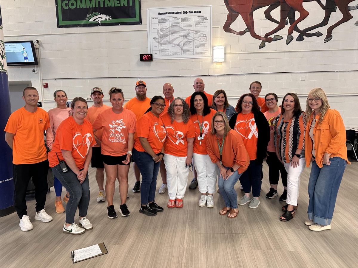 MHS staff show their support of Prader-Willi Syndrome Awareness Day on May 15 by wearing orange. Orange is the color associated with hunger awareness, according to Prader-Willi Syndrome Association. 